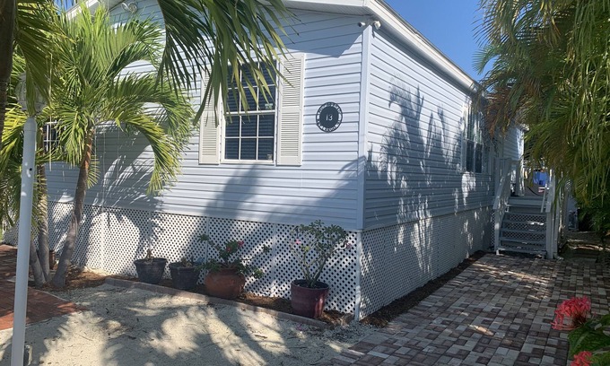 Sexton Cove Estates House | Enjoy this relaxing beachy house on a canal flowing into sexton cove bay.