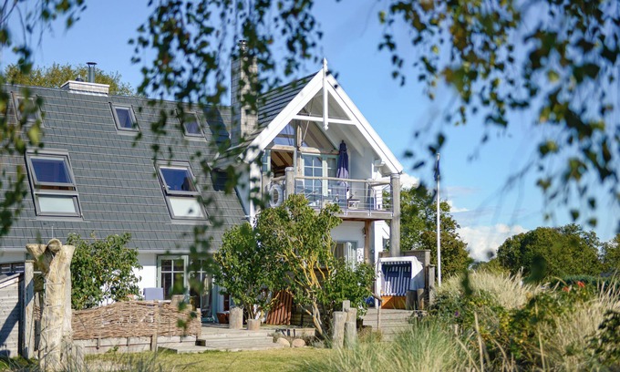 Fehmarnsund Apartment | Enjoy your vacation: Terrace, fireplace & sea view at BEACHHOUSE-Fehmarn -Ostwind