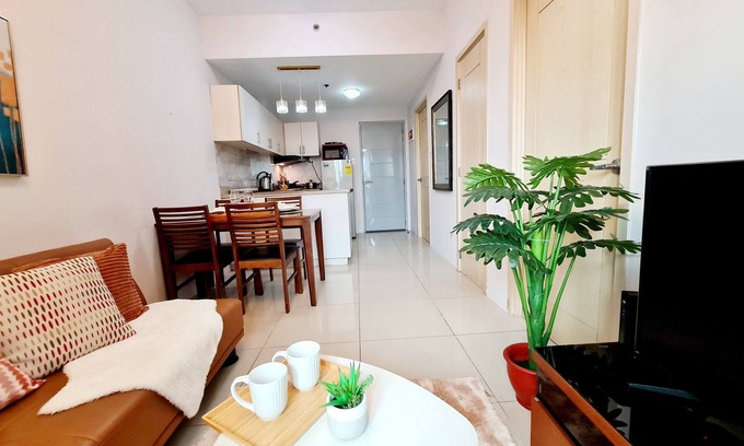 Santo Cristo Condo | Entire 2BR nr SM North Fastnet Netflix Parking