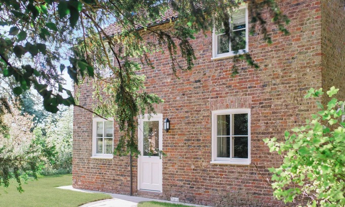 Saltmarshe Cottage | Escape to Gardeners Cottage, a tranquil retreat on the Saltmarshe Hall Estate.