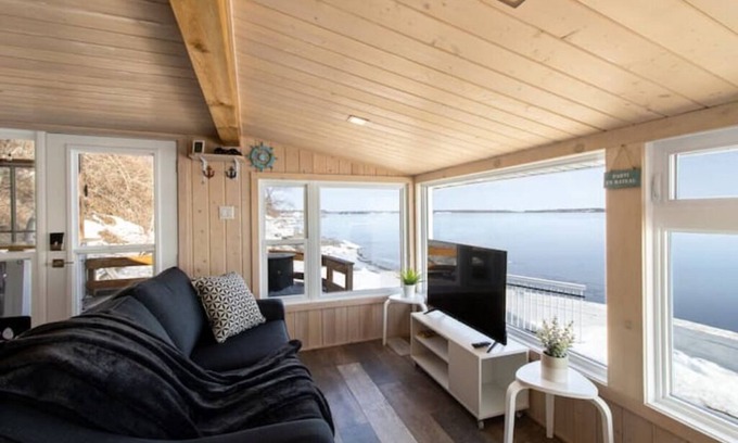 Grondines Cottage | Escape to Riverfront, Relax with Hot Tub, BBQ