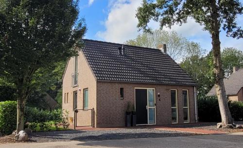Ewijk House | Evergreen wellness met sauna & hottub