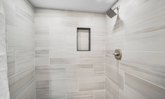 Charlevoix Condo | EWI 103 | Lake Charlevoix Views | Downtown Charlevoix | Pool, Hot Tub, Sauna