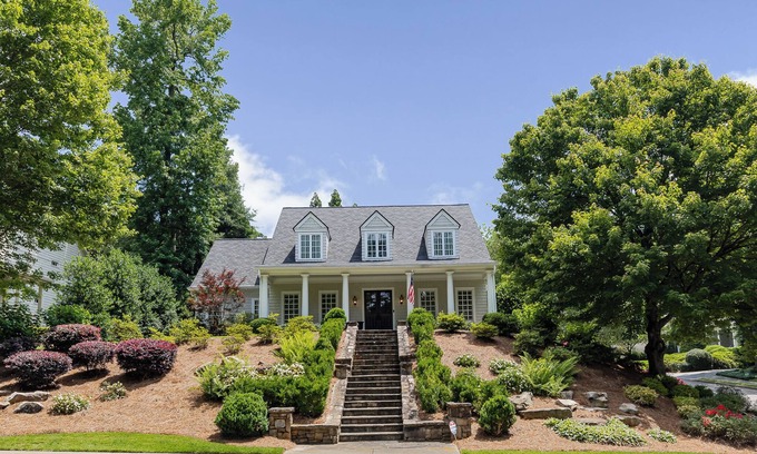North Buckhead House | Expansive 5BR/7BA home in Buckhead, just 9.8 miles from Mercedes-Benz Stadium. Features a chef’s kitchen, in-law suite, ensuite baths, basement lounge, office, gym, and screened patio. Ideal for families, groups, or traveling fans.