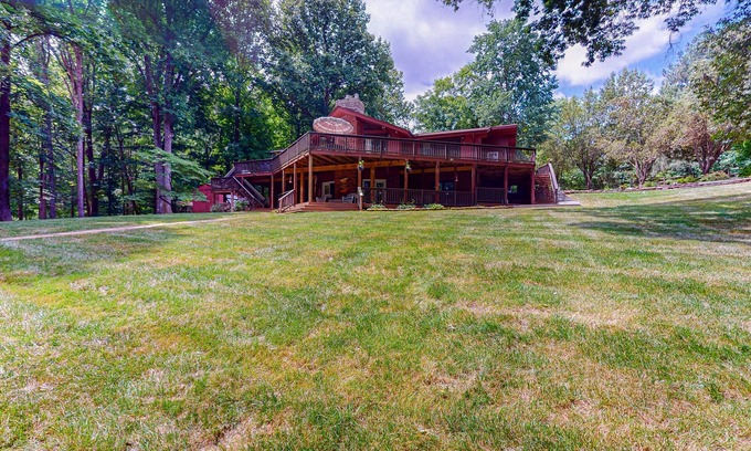 Blue Water House | Expansive lakefront retreat with private dock, fast WiFi, gas grill & central AC