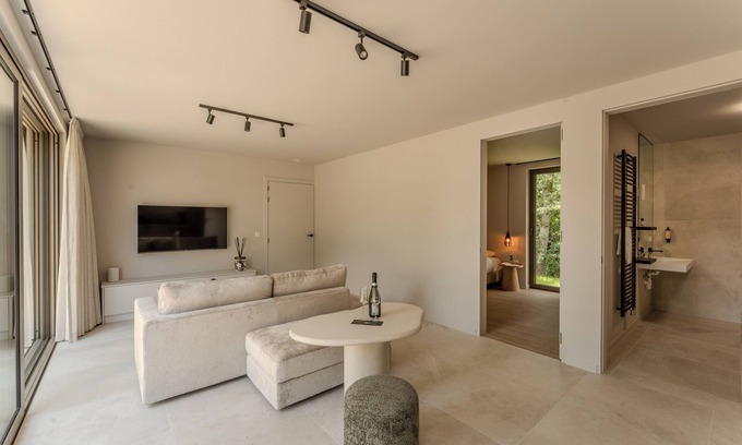 Zolder House | Experience luxury and romance in the Suite, a perfect destination for a relaxing getaway with all comfort and style.