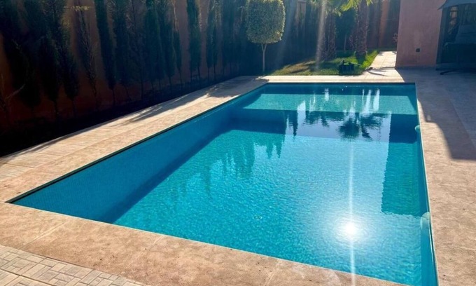 Sidi Abdallah Ghiat Villa | "Experience luxury in this beautiful Marrakech villa with a heated private