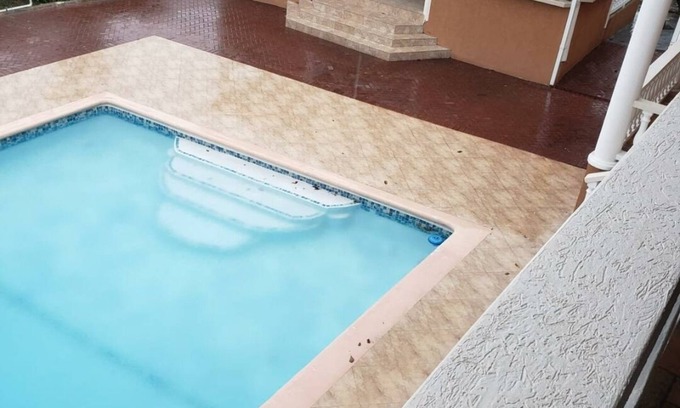 Runaway Bay House | Exquisitely tasteful Jem between the hills and the sea.