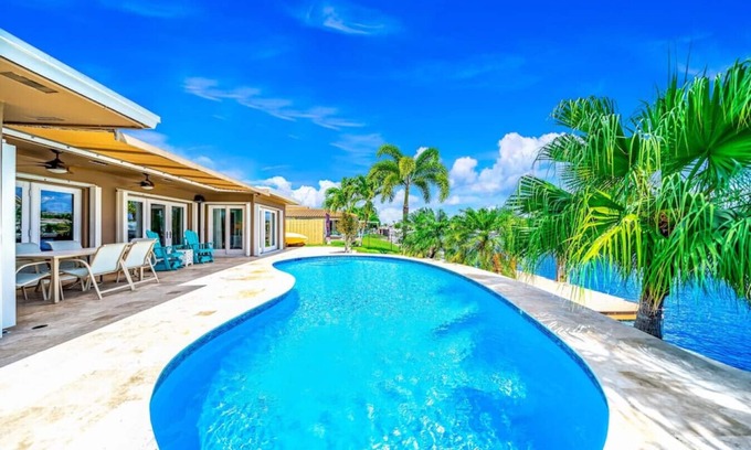 Cypress Lakes House | EXQUISITE HEATED POOL+WATERFRONT! 1 MILE TO BEACH!