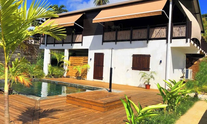 Tartane House | F3 Hibiscus - vue mer - Piscine Chauffée - 9 min de la mer
