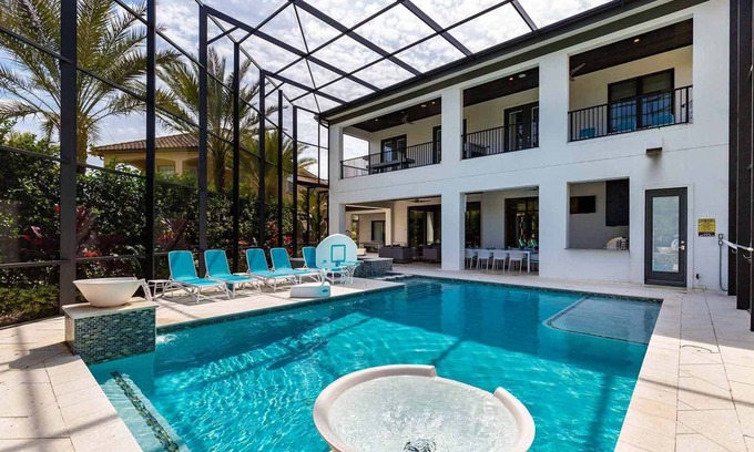 Reunion House | Fab Villa Near Disney w Arcade, Theater, Game Loft & Bar, Huge Balcony, Spa Pool