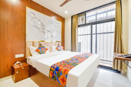 Malviya Nagar Hotel | FabHotel Blooming Beds Pearl