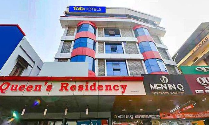 Shenoys Hotel | Fabhotel Central Queens Residency