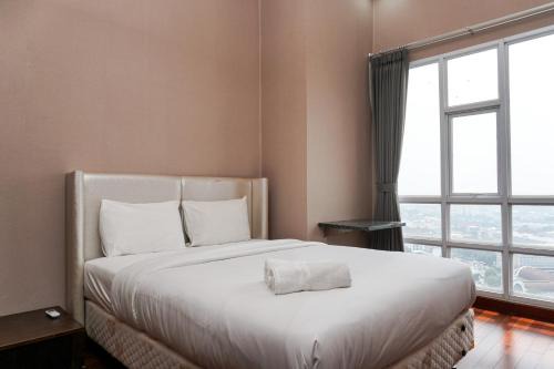 Old Jakarta Apartment | Fabulous 2BR Apartment Lucky Tower Residence By Travelio