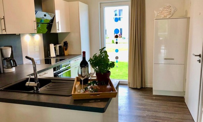 Schillig Apartment | Familienhaus an der Nordsee - Sauna - Kamin - Südterrasse direkt über dem Wasser