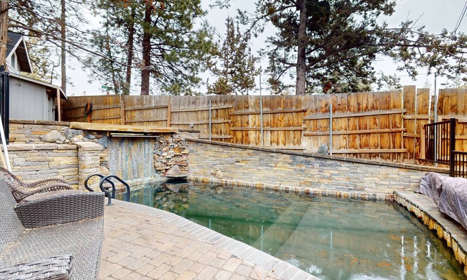 Bend House | Family-friendly home with private pool and hot tub, home theater, shuffleboard