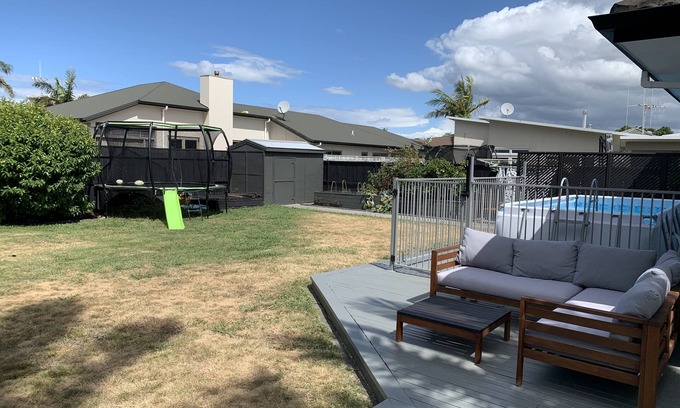 Papamoa Beach House | Family Friendly Retreat + Pool & Spa