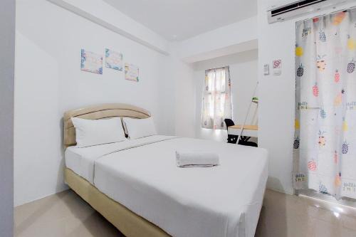 South Tangerang Apartment | Fancy and Nice Studio at Urbantown Serpong Apartment By Travelio
