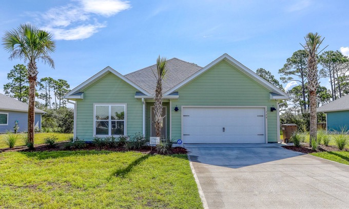 Port St. Joe House | Fantastic coastal home with beach boardwalk, shared pool, private porch & WiFi