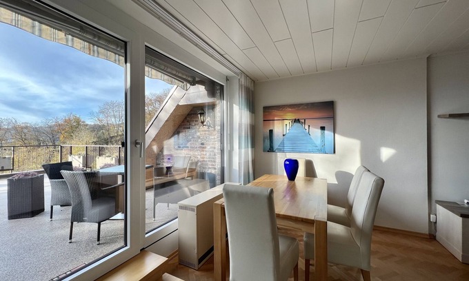 Woffelsbach Condo | Fantastic maisonette apartment on a south-facing slope above the Rursee in Woffelsbach