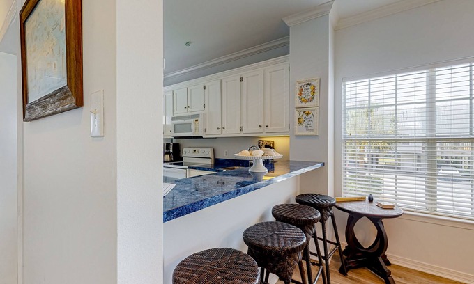 Dauphin Island Condo | Fantastic island condo with beach access, 2 pools, free WiFi, & furnished patio