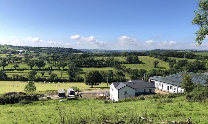 Carmarthen Bed & Breakfast | Farm setting with large living areas and wood fired hot tub