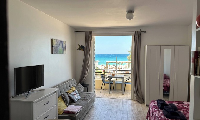 Villeneuve Loubet Beach Apartment | Feet in the water, the view of the beach and the sea