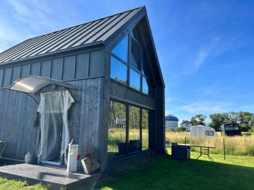 Nowe Warpno House | Ferienhaus“ Blaues Wunder“ am Wasser mit Grill