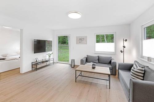 Neuhaus House | Ferienhaus Dünenwald