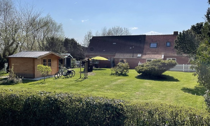 Nesse House | Ferienhaus Muschel mit Garten an der Nordsee