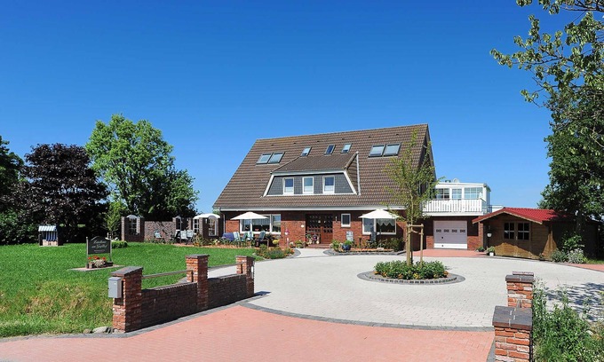 Neuharlingersiel Apartment | Ferienwohnung Wiesenblick im Landhaus am Grafthof - Ferienwohnung Wiesenblick