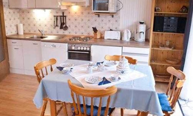 Dornumergrode Apartment | Ferienwohnung Deichblick 1 - Ferienhaus Fünf Trabanten
