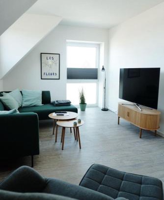 Neuharlingersiel Apartment | Ferienwohnung KÖÖK Heimathafen - Modern, Balkon, Strandnah