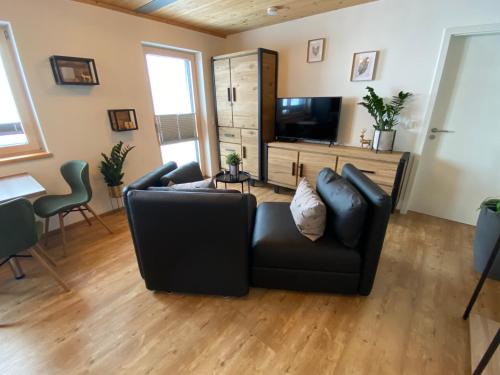 Oy Apartment | Ferienwohnung mit eigenem Garten und Bergblick