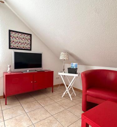 Esens Apartment | Ferienwohnung Muschel 2 mit gemeinschaftlichen Garten, Bensersiel