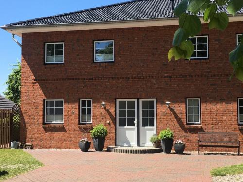 Dannau Apartment | FeWo Ostsee Oldenburg Holstein Garten und Carport