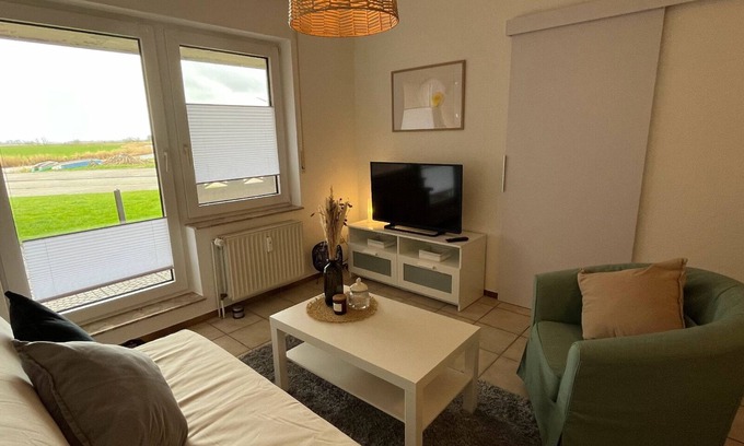 Westeraccumersiel Apartment | Fewosielblick 10 Gehminuten bis zum Wattenmeer