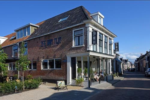 Holwerd Hotel | Fietshotel Zee van Tijd Holwerd