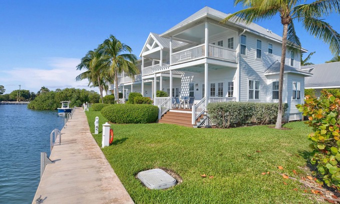 Coral Lagoon House | Finest location in Coral Lagoon. End unit with bay views and boat slip!