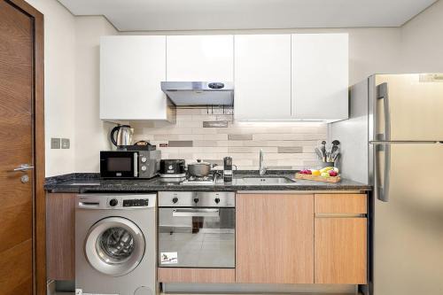 Discovery Gardens Apartment | FIRST CLASS Studio Classy Comfort