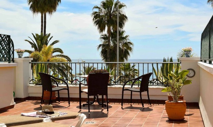 Nerja Apartment | First line of beach, comfortable apartment overlooking Playa Burriana bay