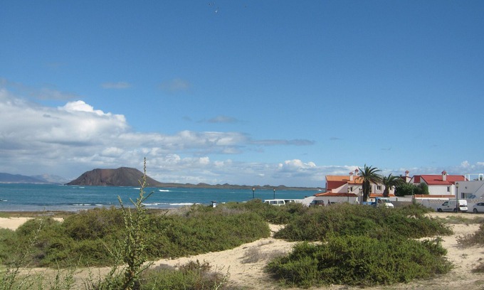 Corralejo Villa | First line of sea and beach, beautiful and quiet Villa with private heated pool.