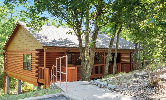 Branson Theater District Cabin | Fishing Themed Retreat for Two - King Bed Cabin with Fireplace & Jacuzzi Tub