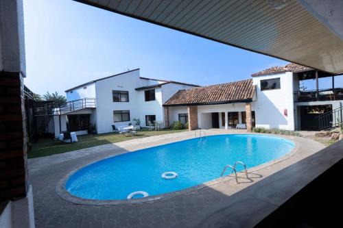 Remera Hotel | Flame Tree Village