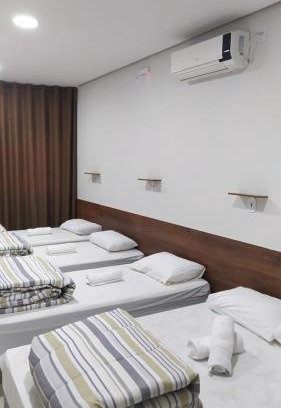 Aparecida House | Flat familiar com ar,wi fi,cozinha e garagem
