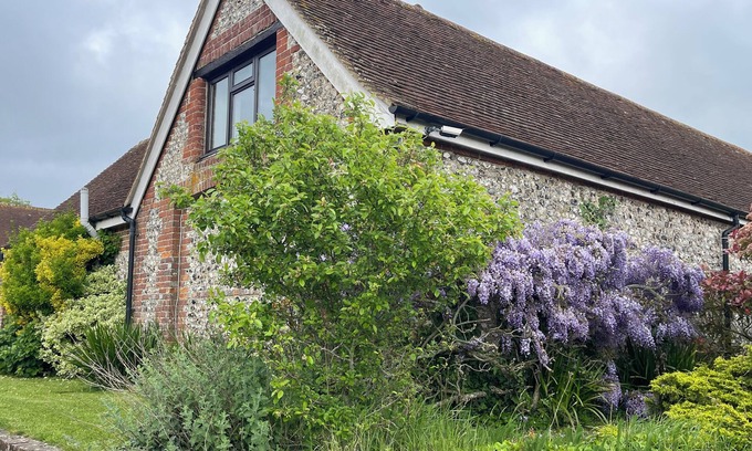 Arundel House | Flint Barn in Arundel With Vaulted Lounge, Private Gardens, new Kitchen, Parking