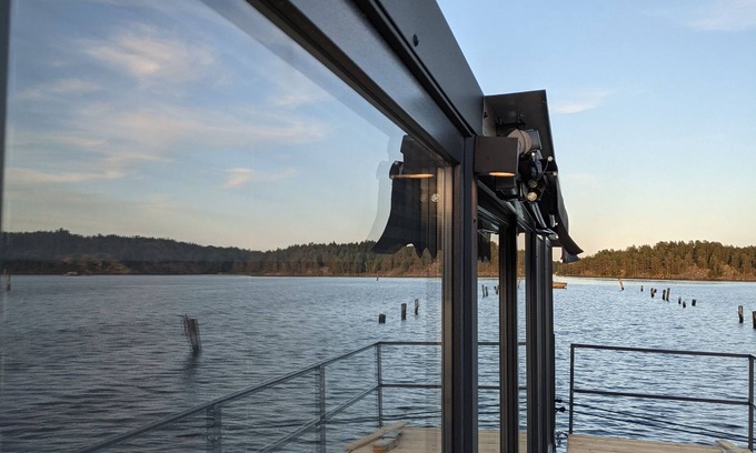 Blankaholm Boat Rental | Floating house, unobstructed view of the beautiful water with boat, Blankaholm Sweden