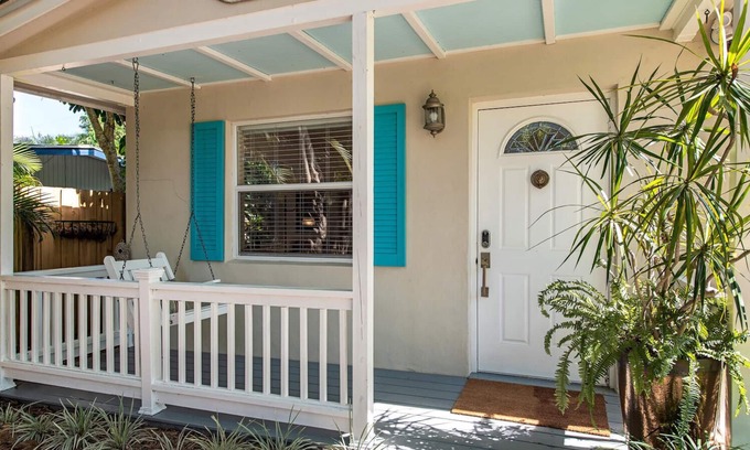 Central Naples House | Florida bungalow with loads of charm in tropical and private setting.