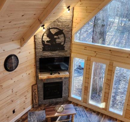 Mannsville House | Flying High Luxury Cabin