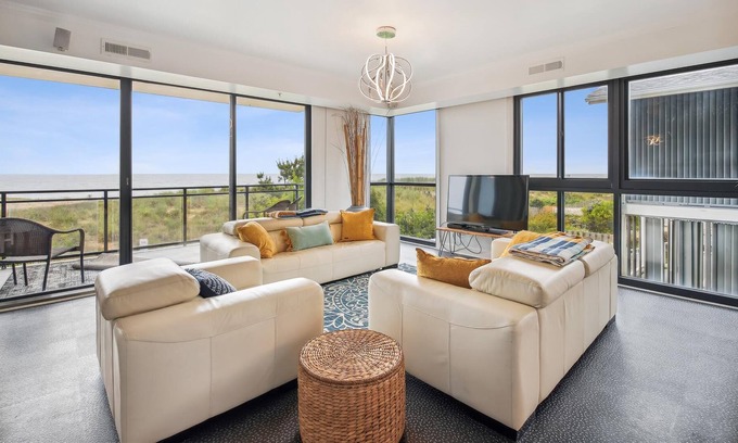Midtown Ocean City House | FREE ACTIVITIES AND LINENS! Fantastic 4BR, 4.5BA modern oceanfront townhouse with ground level access to the beach access! Secure elevator access to your private condo lobby!